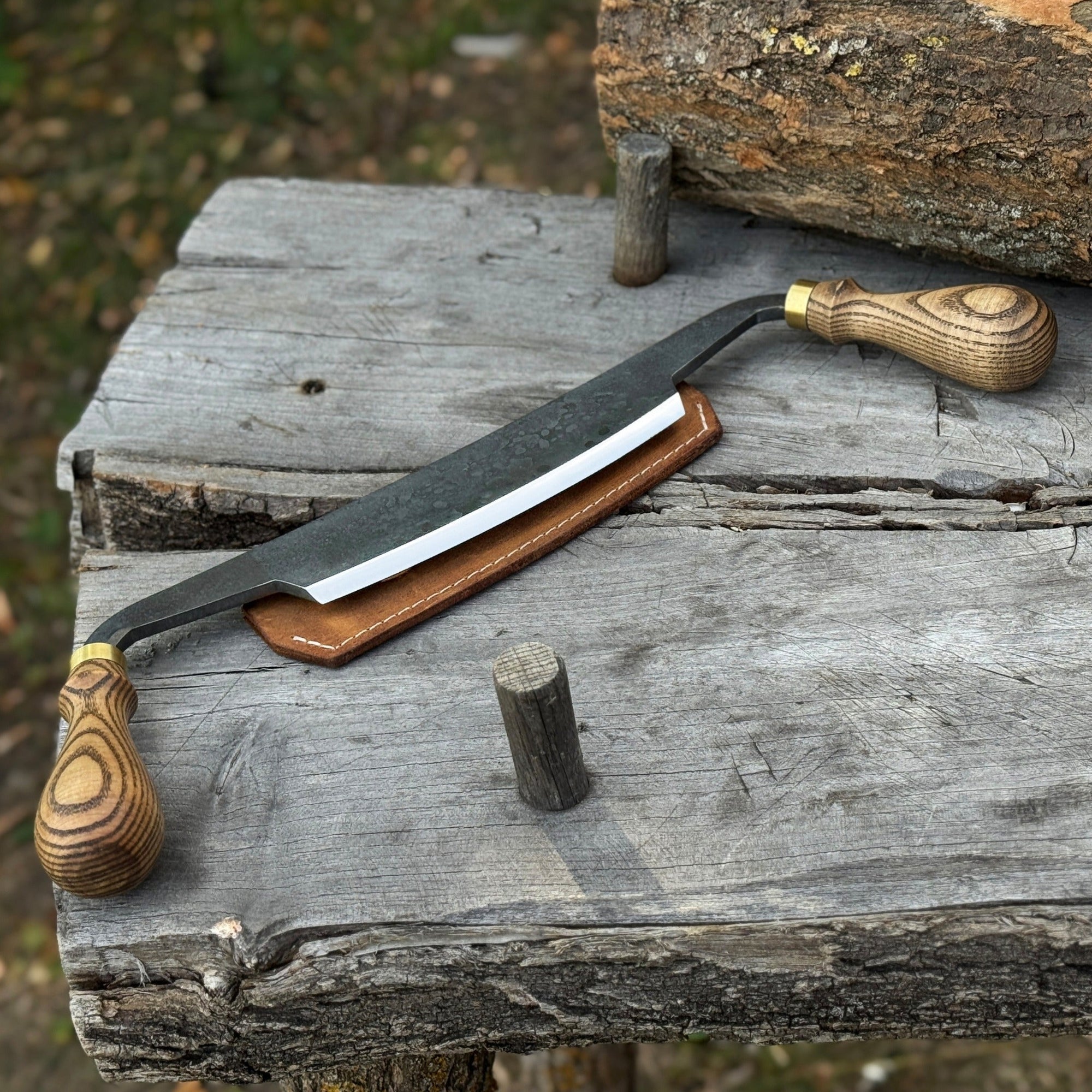 Curved Draw Knife with 14.5 cm cutting edge and ash wood handle by Sharky Forged Steel Tools