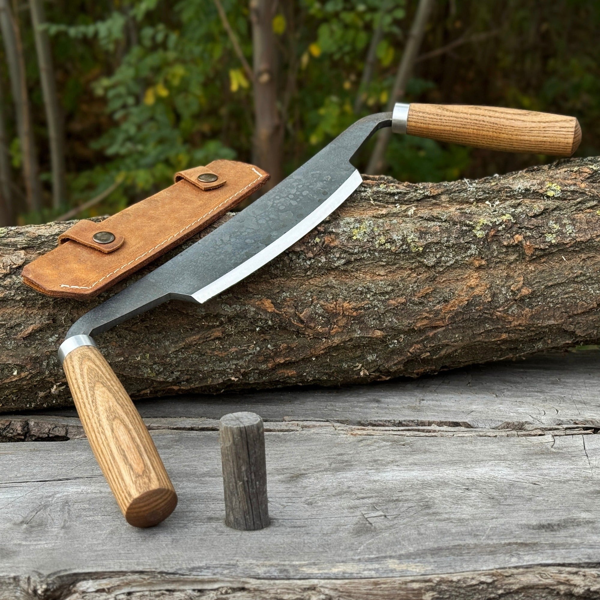 Curved Drawknife with wooden handles and leather sheath by Sharky Forged Steel Tools