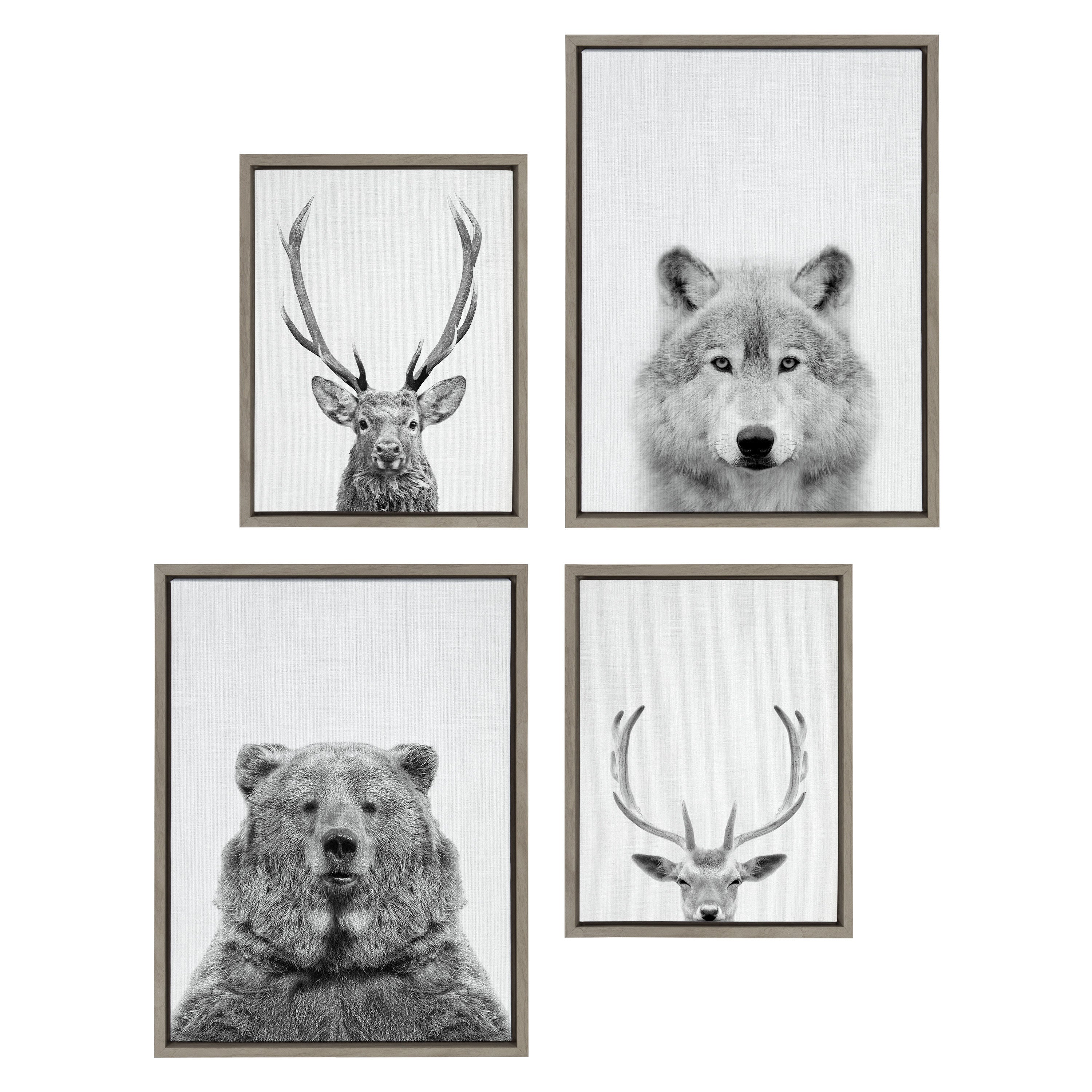 Black and white framed canvas art set showing deer, wolf, and bear wildlife images
