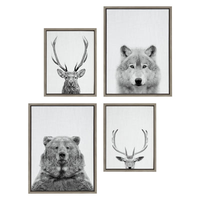 Black and white framed canvas art set showing deer, wolf, and bear wildlife images