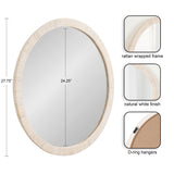 Oval wall mirror with a 24.25-inch reflective surface, framed with a textured rattan wrap in a natural white finish featuring D-ring hangers for mounting.