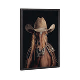 Close-up portrait of a brown horse wearing a weathered western cowboy hat and leather saddle, set against a dark background in a black frame.