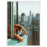 A tiger leans on a green windowsill overlooking a city skyline with tall buildings under a clear sky.