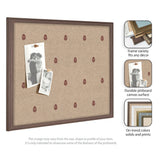 Rectangular burlap-textured pinboard with a repeating small red botanical print, framed in medium brown wood, displaying two black-and-white pinned photos.