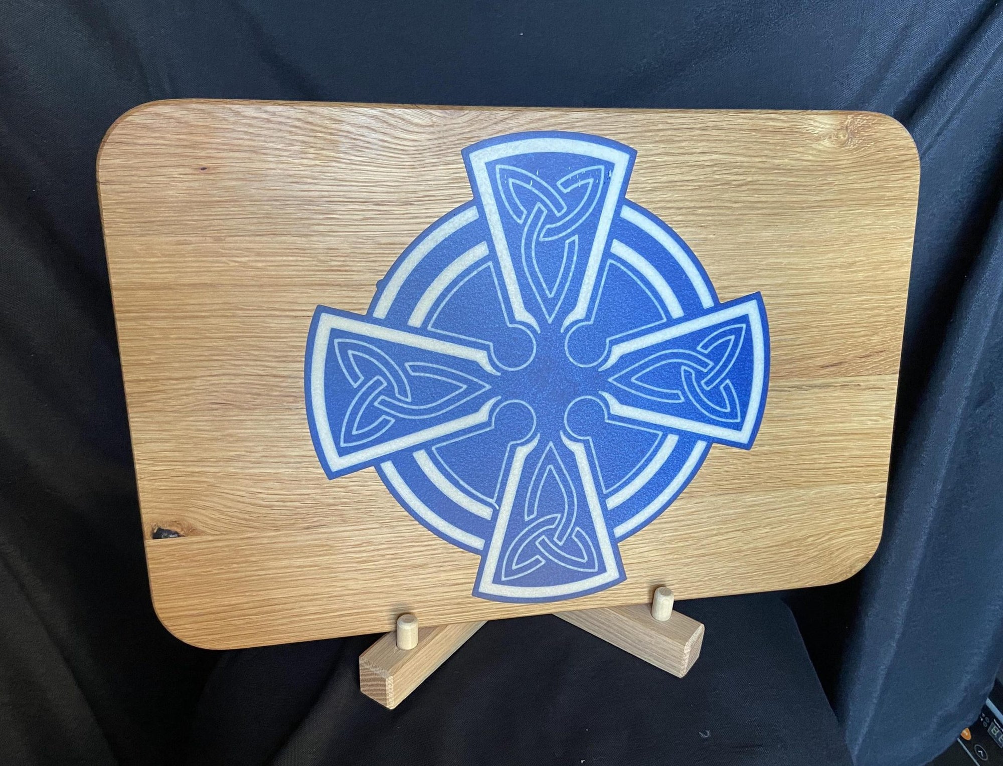 Handmade Celtic Cross charcuterie board in white oak with white on blue resin inlay