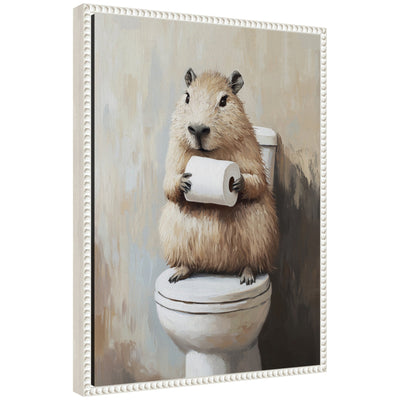 Framed canvas art featuring a capybara angled holding a toilet paper roll