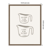 Framed minimalist art print illustrating kitchen measuring cups with 1/2 cup equal to 4 oz and 8 tbsp, and 1 cup equal to 8 oz and 16 tbsp in gray on white.