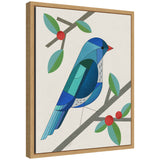 Framed abstract art print titled 'Sylvie MCM Bluebird' by Carey Copeland, showing blue and orange geometric shapes on white gallery-wrapped canvas with thin dark frame.