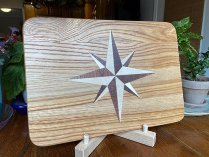 Handcrafted white oak charcuterie board with compass rose inlay