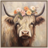 Portrait of a Highland cow with long cream and brown fur wearing a floral crown of soft pink, orange, and white flowers against a light neutral background.