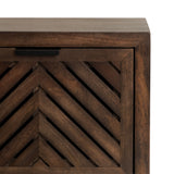 Close-up of a dark wood door panel with chevron pattern featuring diagonal slats framed by a solid rectangular border and a small black handle at the top.