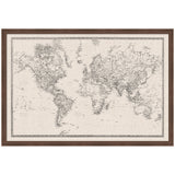Framed vintage-style black and white world map on a textured linen background, showing detailed continents and a decorative border with a dark wood frame.