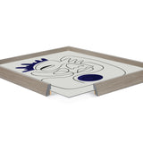 Abstract line art with blue accents on white, framed in light wood with shown corner joint detail.