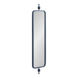 Tall, narrow rectangular mirror with rounded corners and a dark blue metal frame, topped and bottomed by matching decorative finial accents.