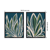 Two framed canvas art pieces featuring abstract green and yellow leaf shapes with white accents on a deep blue background, each measuring 38 by 24 inches.