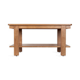 Rectangular wooden coffee table with thick legs and a lower shelf, showcasing a smooth, warm brown finish and clean, sturdy design from the front view.