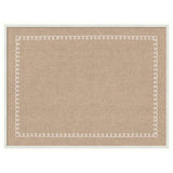 Rectangular cork pinboard with a white scalloped edge pattern and a white frame surrounding it.