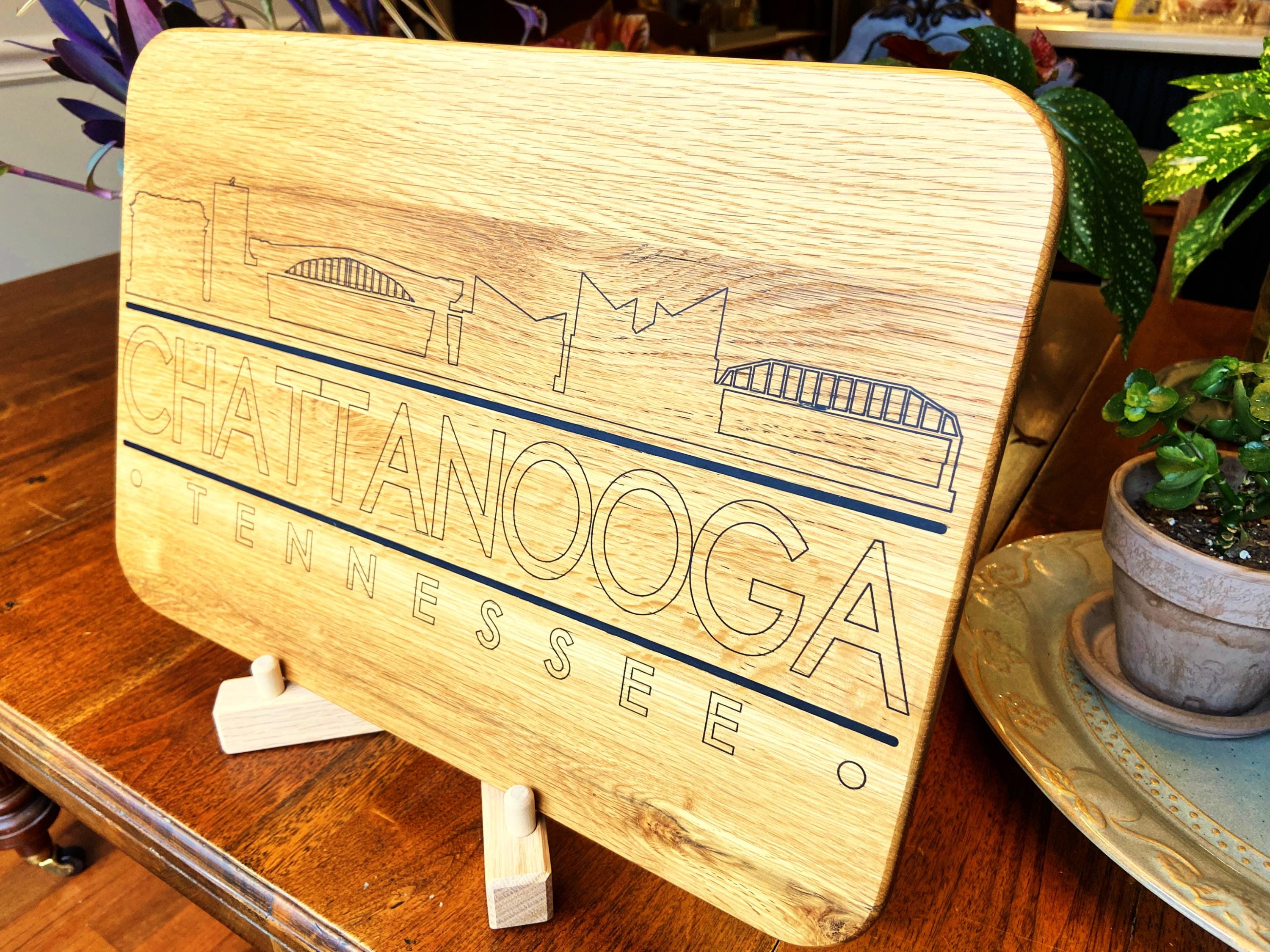 Handmade white oak charcuterie board with engraved Chattanooga skyline