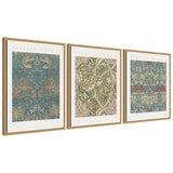 Three framed canvas art pieces featuring William Morris poster prints with floral and nature motifs, arranged side by side on a white wall.