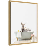 Framed canvas art showing a zebra sitting inside a gray bathtub against a soft light background