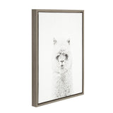 Framed canvas art featuring a close-up portrait of a white alpaca with detailed fuzzy fur, against a plain white background, in a simple wooden frame.