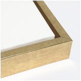 Close-up of a white canvas tightly stretched in a matte gold wooden frame with visible wood grain and sharp mitered corner.