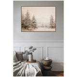 Softly blurred winter forest painting with tall neutral-toned trees in beige and brown hues, framed and hung above a cozy sofa with textured blankets and wooden side table.