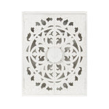 White carved wooden wall cabinet with symmetrical floral and geometric patterns centered around a circular motif, featuring intricate cutout detailing.