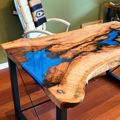 Wooden table with blue resin inlay in a room setting
