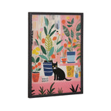 Framed illustration of a black cat sitting among colorful potted houseplants with large green leaves on a pink background.