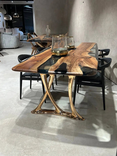 Custom epoxy resin dining room table with walnut wood and rose gold aluminum legs