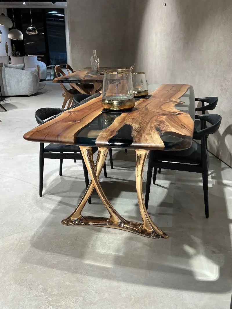 Custom epoxy resin dining room table with walnut wood and rose gold aluminum legs