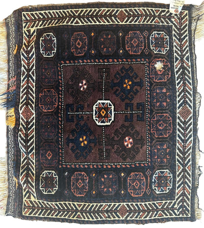 Distressed hand-knotted vintage Afghani Baluchi wool bag face rug, 29 x 25 inches