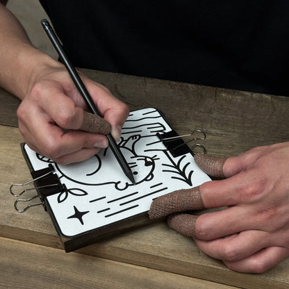 DIY Beaver Carving Kit with V-shaped chisel, pre-painted wood board, and video guide