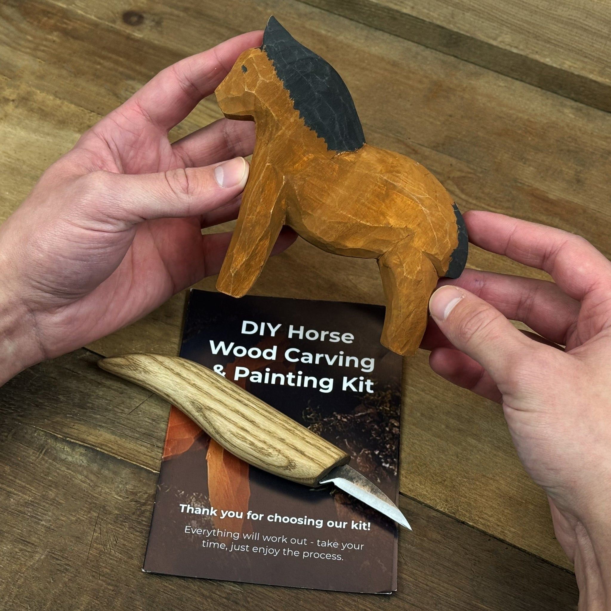 DIY Horse Wood Carving and Painting Kit with carving knife, wooden horse blank, paints, and brushes