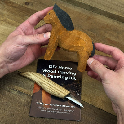 DIY Horse Wood Carving and Painting Kit with carving knife, wooden horse blank, paints, and brushes
