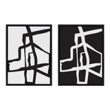 Two framed abstract canvas art pieces with reversed black and white intersecting stroke patterns, one black strokes on white background and the other white strokes on black background.