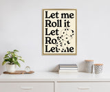 Framed canvas with bold black text repeating 'Let me Roll it' and illustrated black-and-white dice, hanging above a white cabinet with a plant, books, and patterned jars.