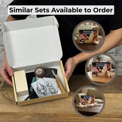 Complete Dog Carving Kit with knife, wood blocks, sandpaper, sharpening board, pencil, and dog drawing guide