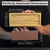 Double-sided sharpening stone with grit #3000 and #8000, shown with optional wooden stand