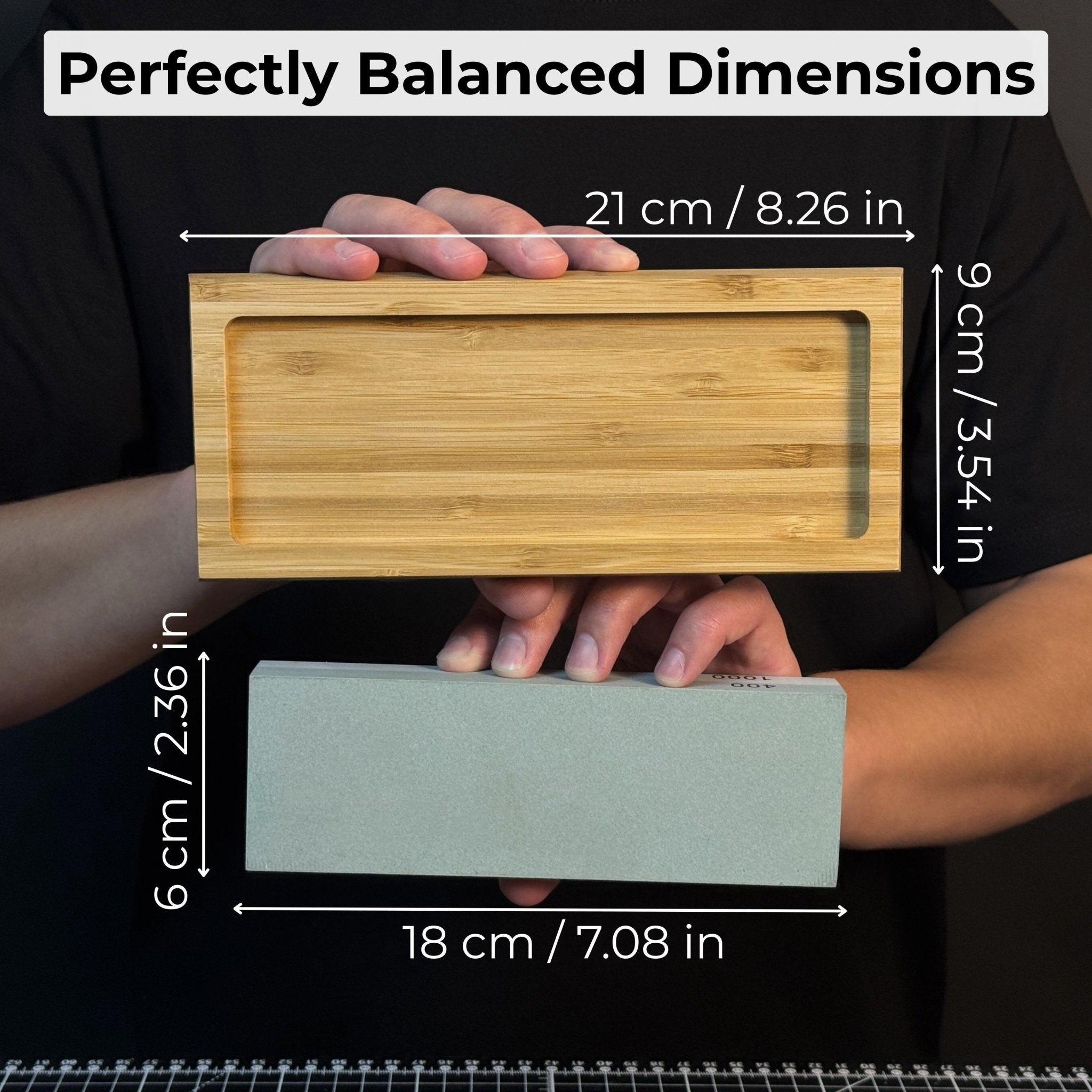 Double-sided sharpening stone with coarse #400 and medium #1000 grit, shown with optional wooden stand