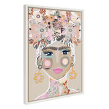 Framed canvas painting of a stylized female face with large brows, pink lips, and floral patterns on her head and neck in soft pastel colors.