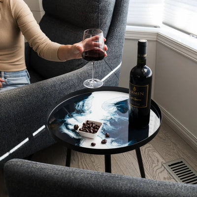 Resin Art Side Table with black metal frame and glossy resin-coated acacia wood tabletop in Northern Lights color