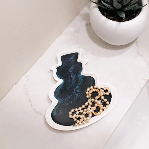 Resin Ceramic Snowman Tray with a black cat design on a marble surface