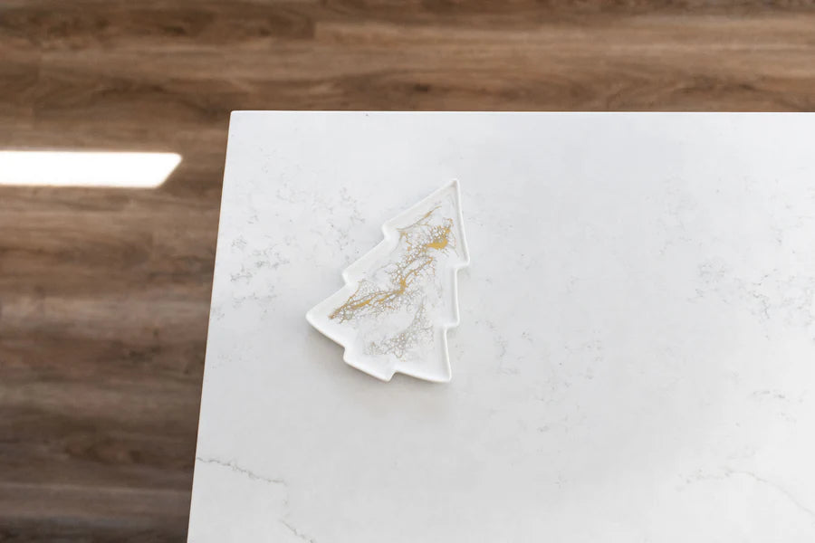 Decorative Resin Ceramic Tray of a Christmas tree on a marble surface with a wooden background