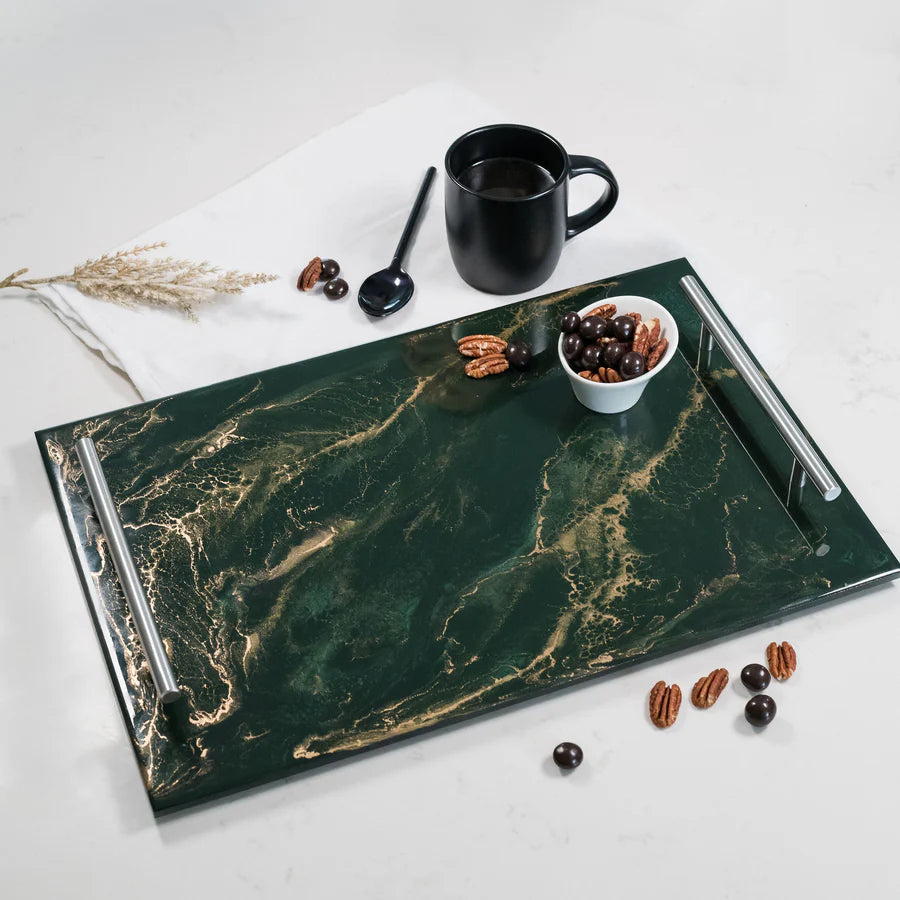 Green marble Acrylic Resin Serving Tray with a black mug, bowl of nuts, and other items on a white background