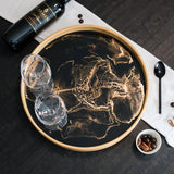 Resin Bamboo Round Tray with natural bamboo grain and resin accents, styled with appetizers and drinks