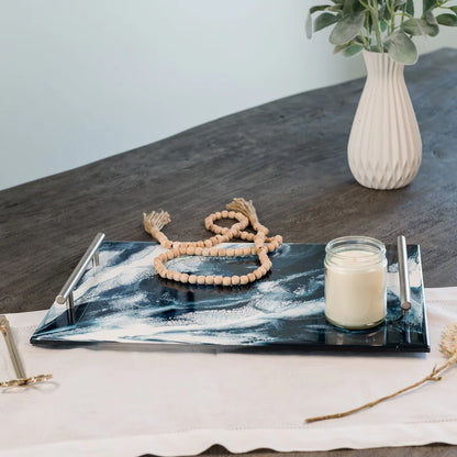 Decorative Acrylic Resin Serving Tray with candle, beads, and vase on a table