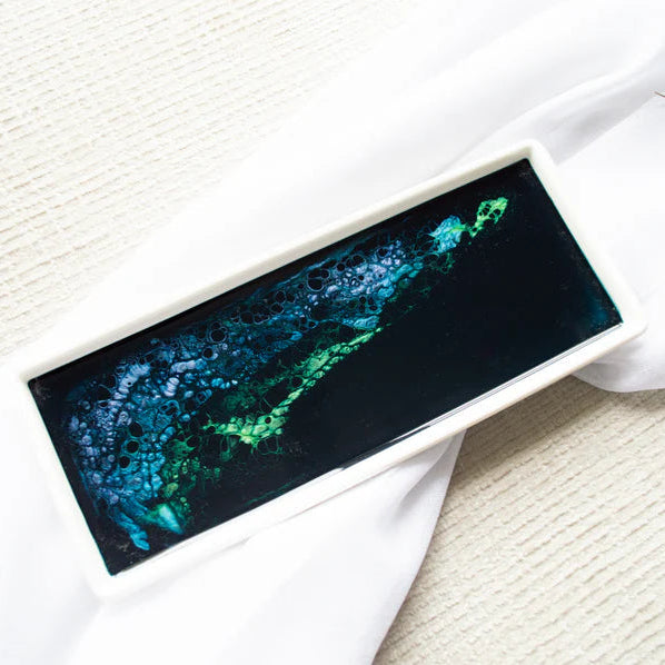 Small Ceramic Resin Tray with a green and blue abstract display on a white surface