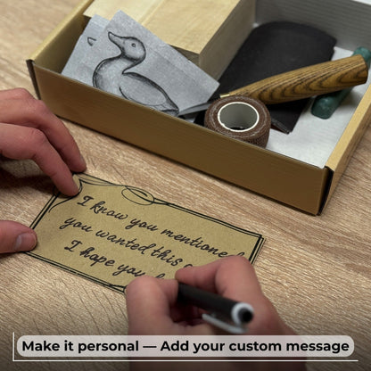 Complete Duck Carving Kit with knife, wooden blocks, sandpaper, sharpening board, pencil, and duck drawing guide